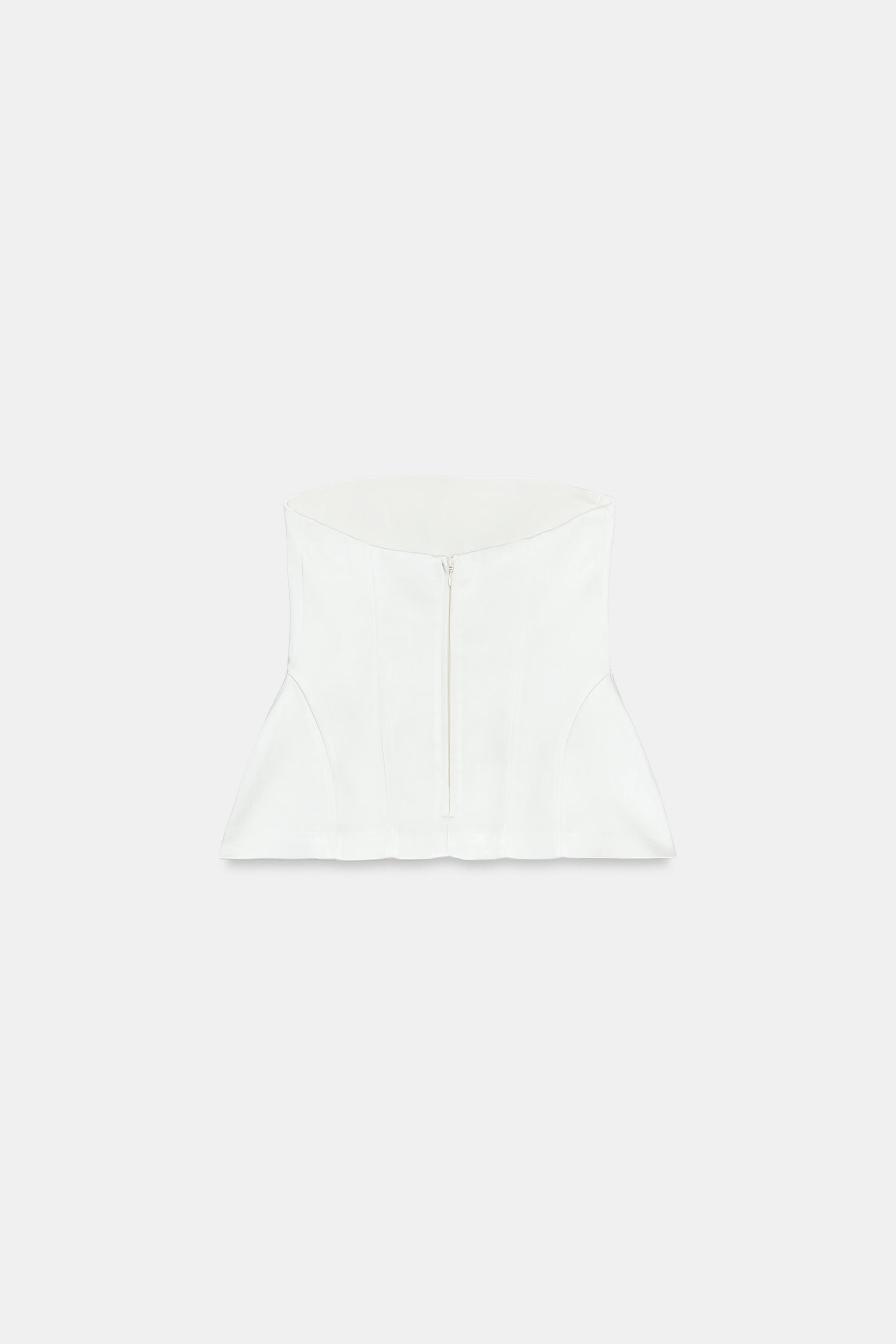 STRAPLESS PEPLUM TOP